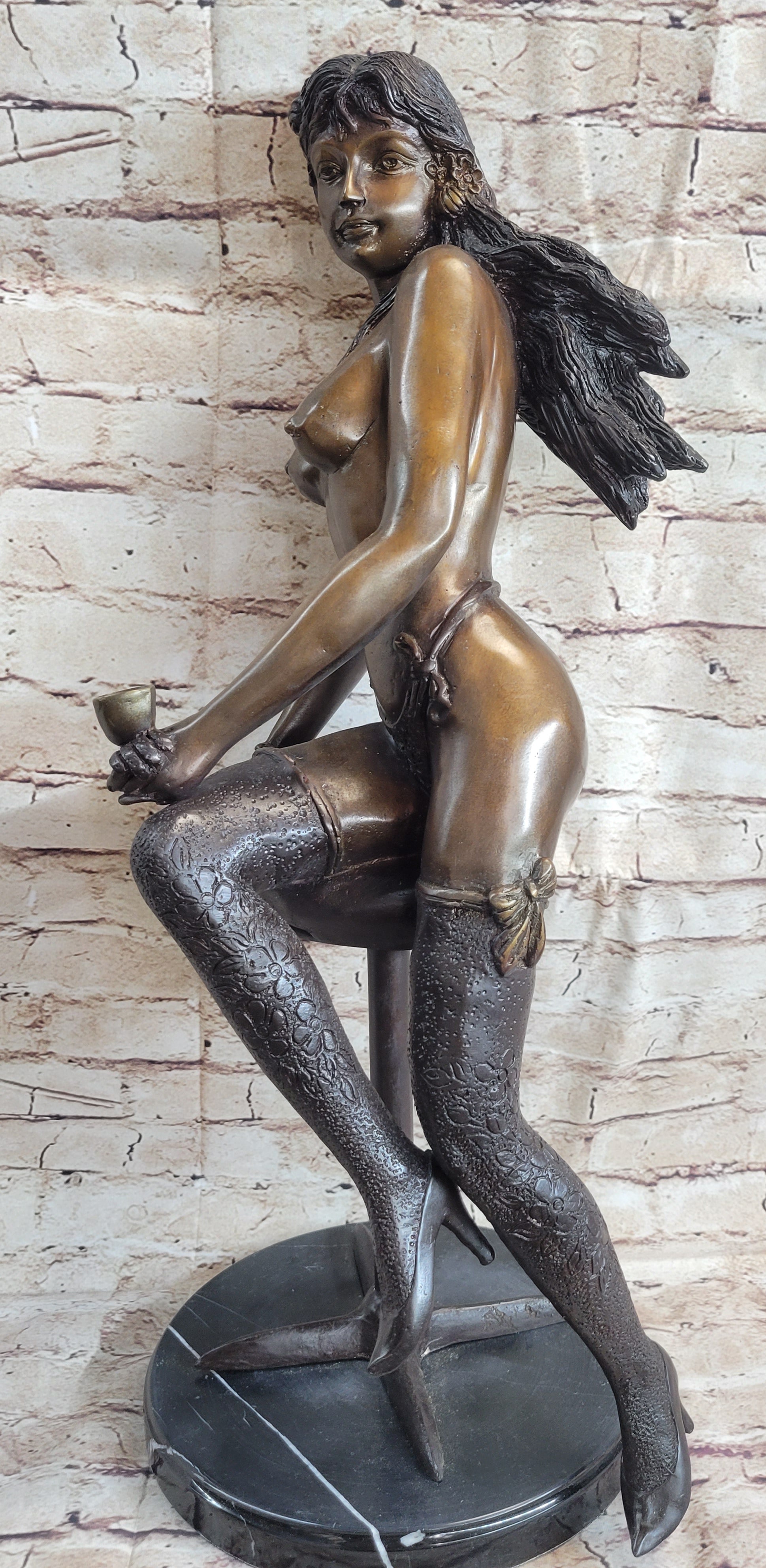 Nude Woman holding a Cup sitting on Stool Bronze Sculpture
