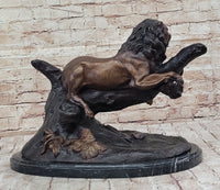 Lion Resting on a Branch - Bronze Sculpture by J. Moigniez