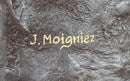 Lion Resting on a Branch - Bronze Sculpture by J. Moigniez