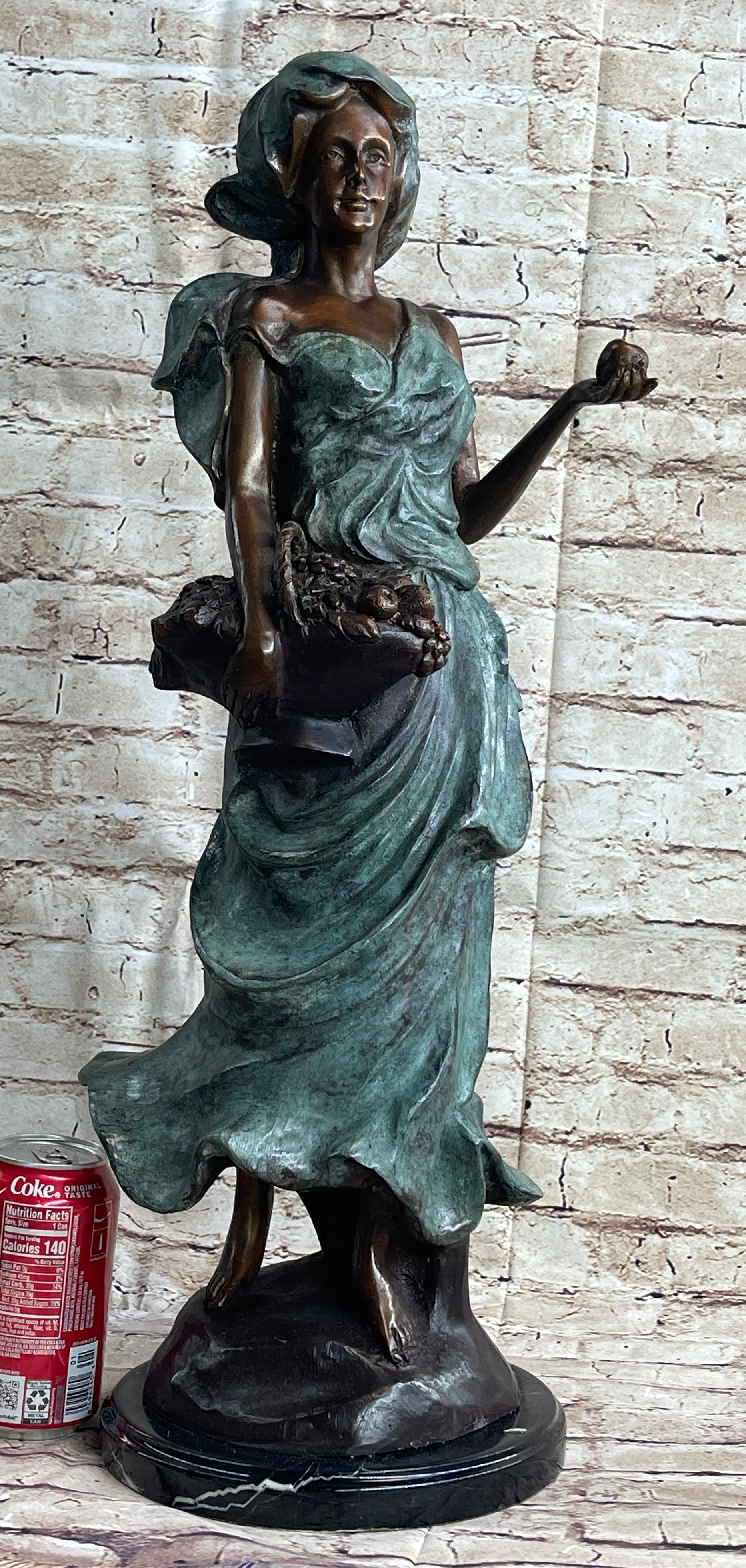 Signed Bronze Sculpture of Young Woman with Basket of Fruits