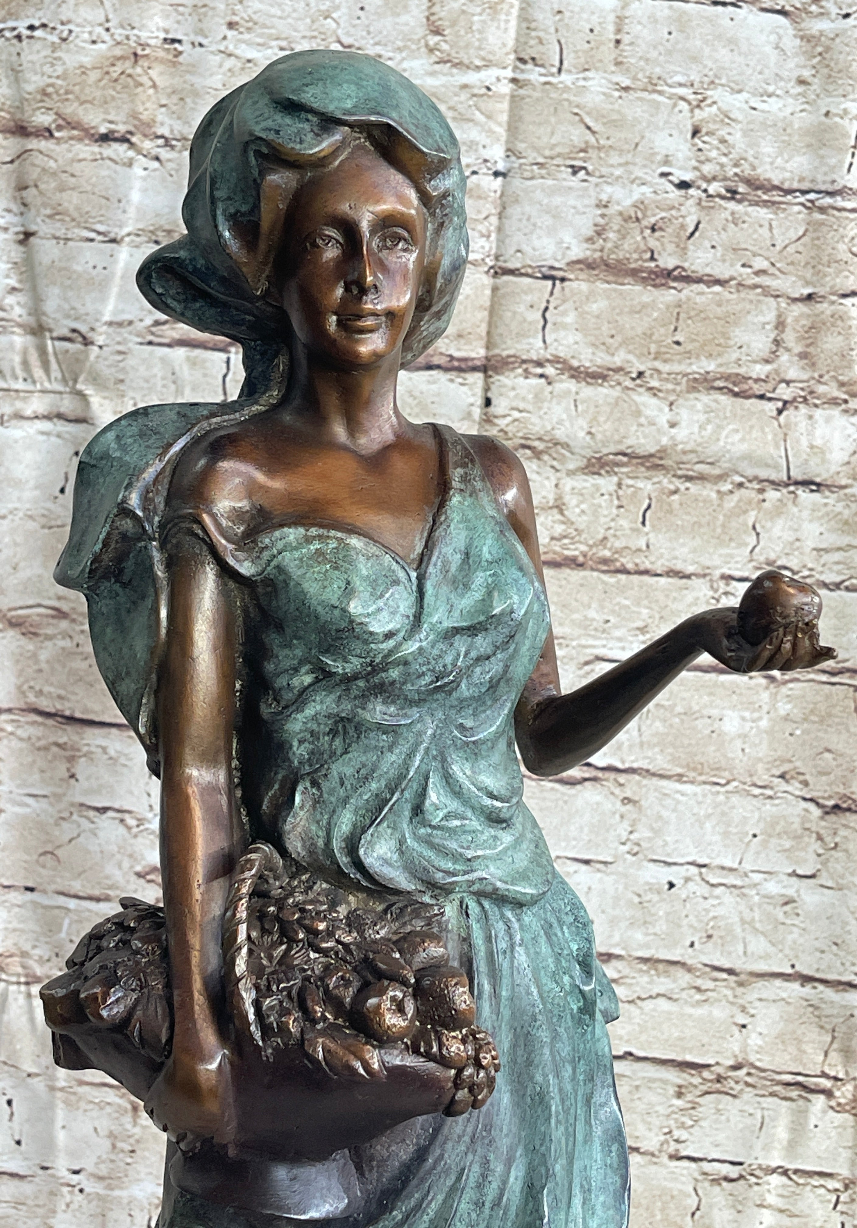 Signed Bronze Sculpture of Young Woman with Basket of Fruits