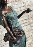 Signed Bronze Sculpture of Young Woman with Basket of Fruits