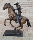Cowboy with Rope on Horseback Bronze Sculpture Frederic Remington