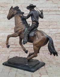 Cowboy with Rope on Horseback Bronze Sculpture Frederic Remington