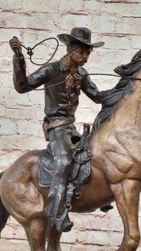 Cowboy with Rope on Horseback Bronze Sculpture Frederic Remington