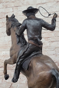Cowboy with Rope on Horseback Bronze Sculpture Frederic Remington