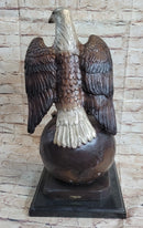American Bald Eagle Perched on Globe Bronze Sculpture