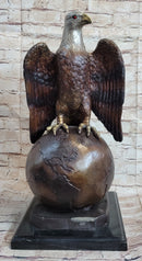 American Bald Eagle Perched on Globe Bronze Sculpture