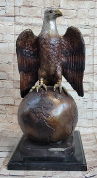 American Bald Eagle Perched on Globe Bronze Sculpture