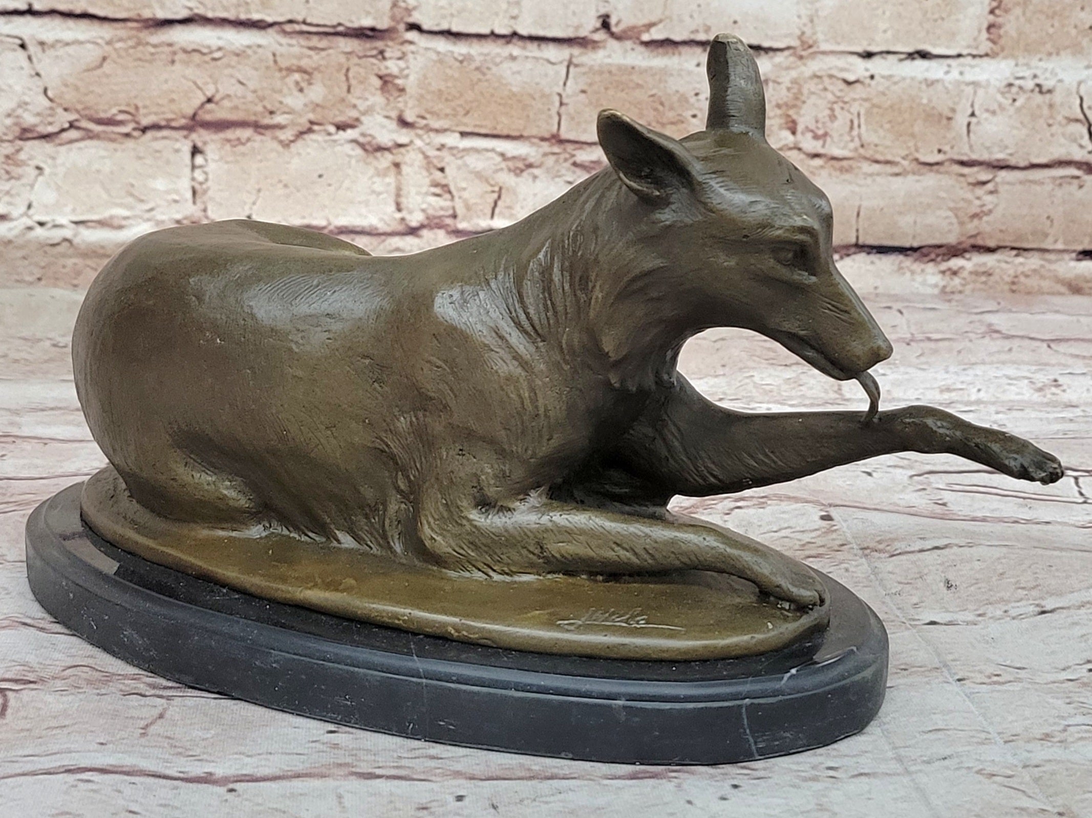 German Shepherd Licking Paw Bronze Sculpture Milo
