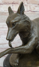 German Shepherd Licking Paw Bronze Sculpture Milo