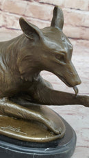 German Shepherd Licking Paw Bronze Sculpture Milo