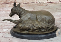 German Shepherd Licking Paw Bronze Sculpture Milo