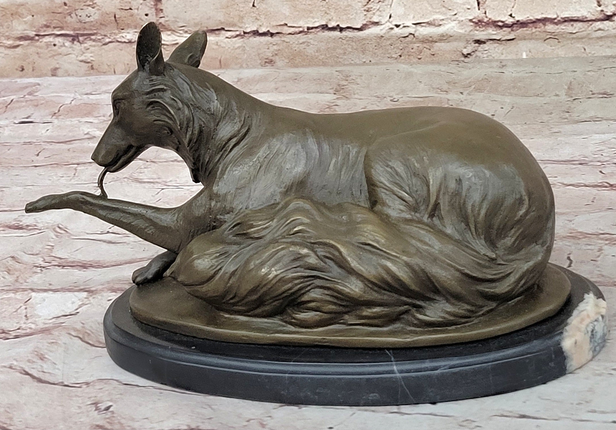German Shepherd Licking Paw Bronze Sculpture Milo