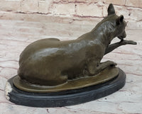 German Shepherd Licking Paw Bronze Sculpture Milo