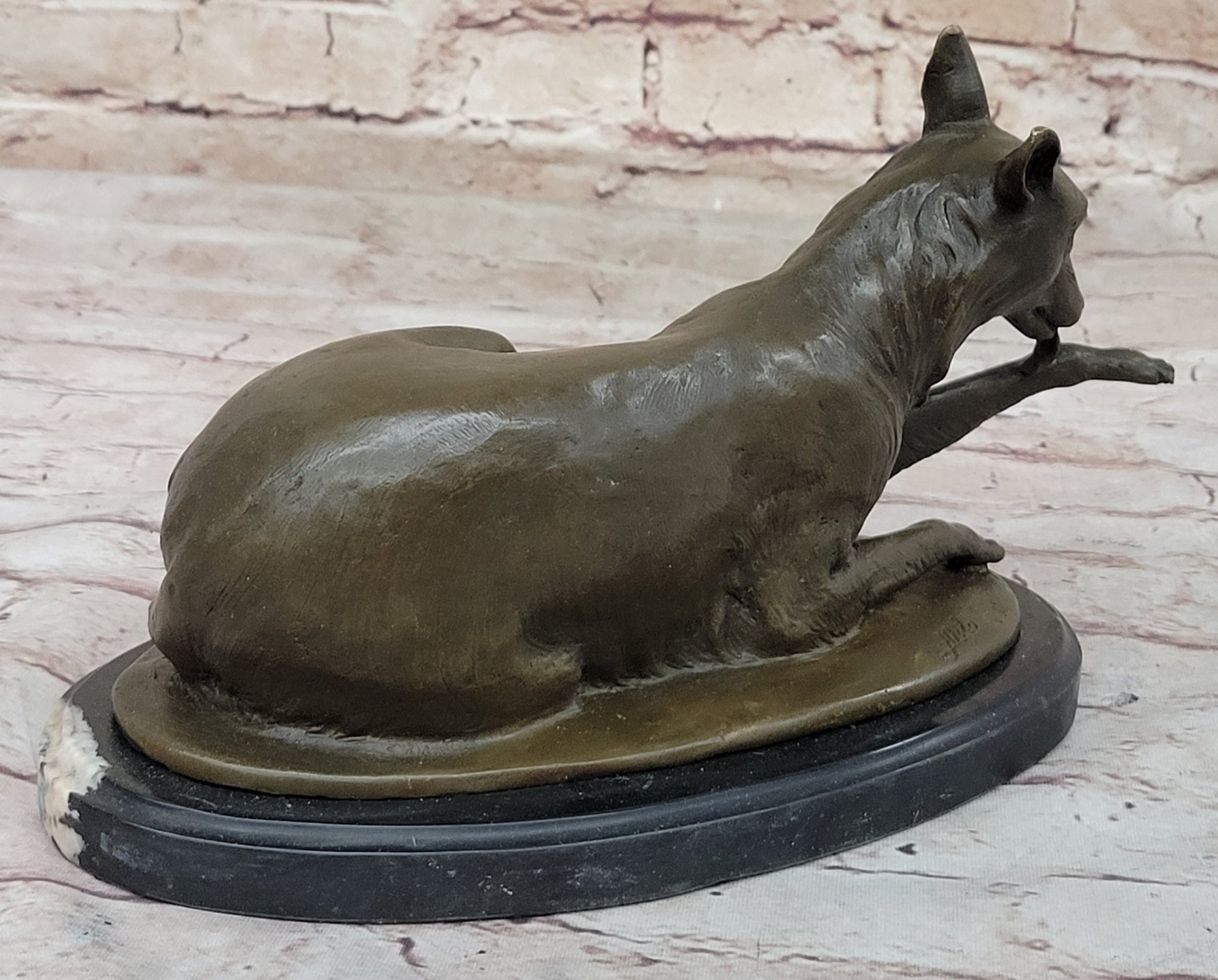 German Shepherd Licking Paw Bronze Sculpture Milo