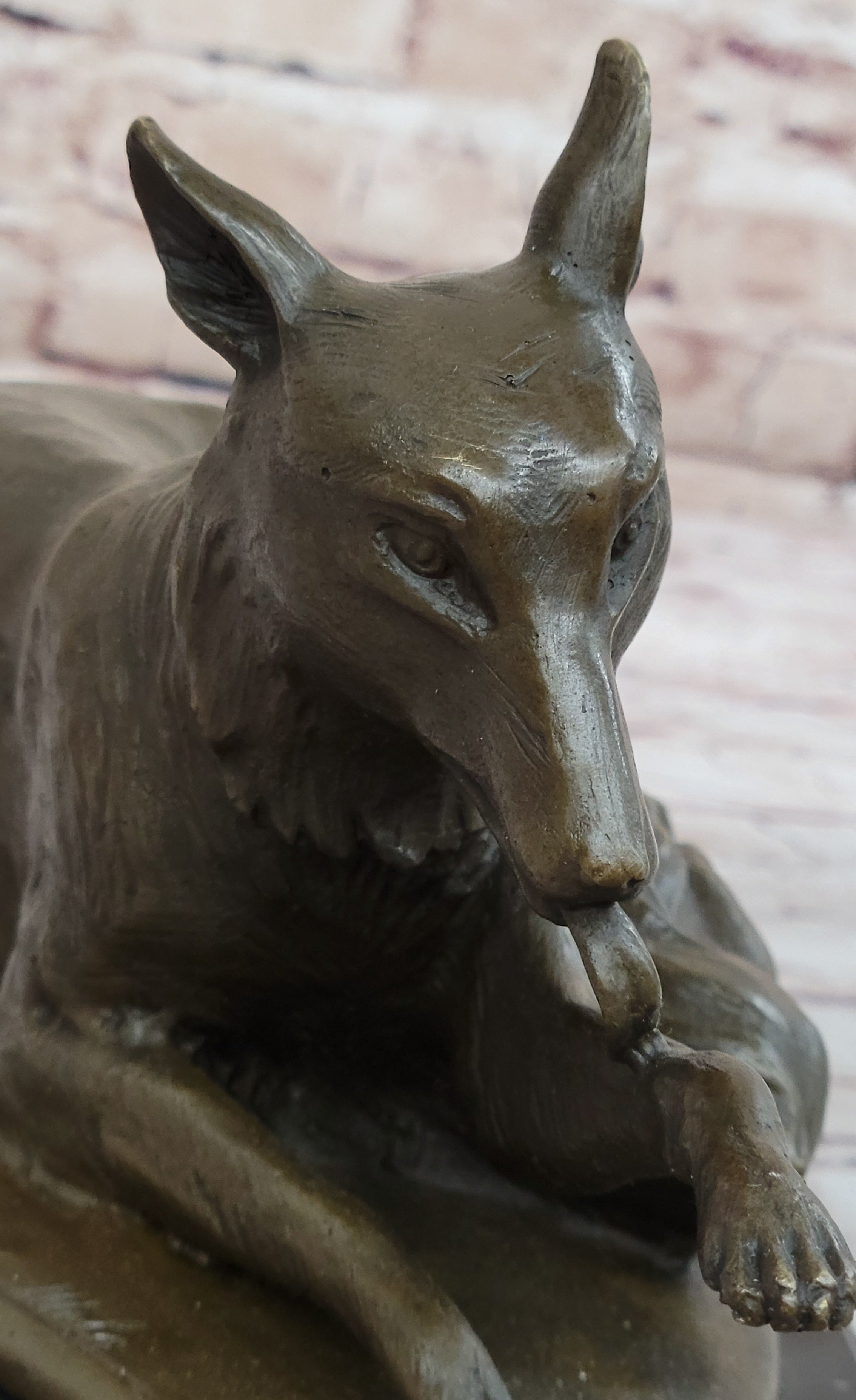 German Shepherd Licking Paw Bronze Sculpture Milo