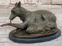 German Shepherd Licking Paw Bronze Sculpture Milo