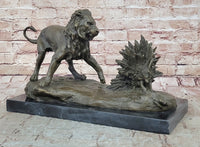 Lion vs. Porcupine Bronze Sculpture on Marble Base