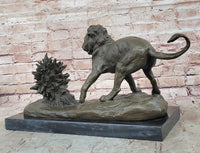 Lion vs. Porcupine Bronze Sculpture on Marble Base