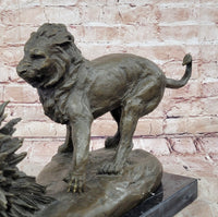 Lion vs. Porcupine Bronze Sculpture on Marble Base