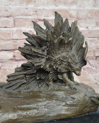 Lion vs. Porcupine Bronze Sculpture on Marble Base