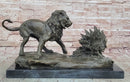 Lion vs. Porcupine Bronze Sculpture on Marble Base