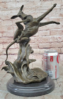 Puppy Dog Catching Frisbee Bronze Sculpture by Milo