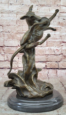 Puppy Dog Catching Frisbee Bronze Sculpture by Milo