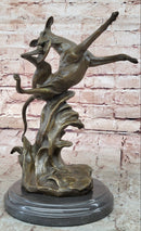 Puppy Dog Catching Frisbee Bronze Sculpture by Milo
