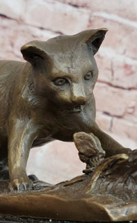 Cat playing with a butterfly by Miguel Fernando Lopez (Milo) Bronze Sculpture