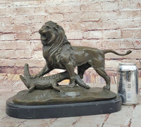 Bronze Lion vs Crocodile by Delabrierre – Wildlife Showdown