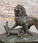 Bronze Lion vs Crocodile by Delabrierre – Wildlife Showdown