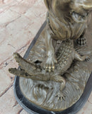 Bronze Lion vs Crocodile by Delabrierre – Wildlife Showdown