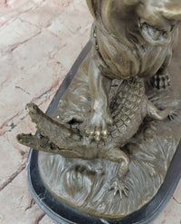 Bronze Lion vs Crocodile by Delabrierre – Wildlife Showdown