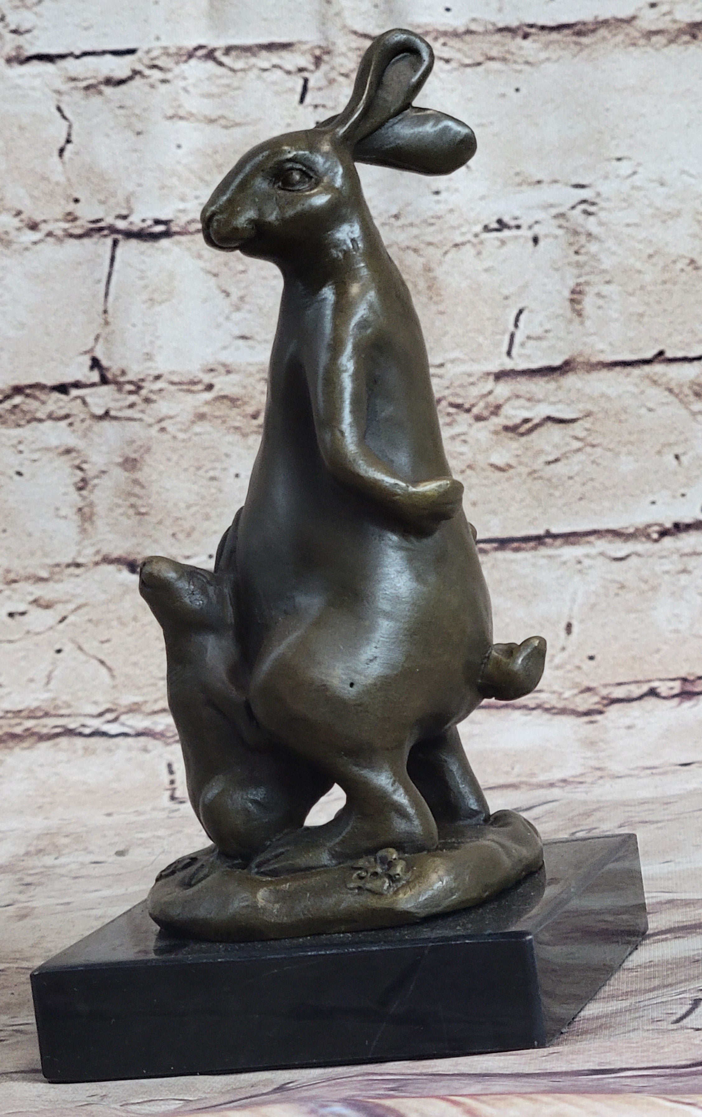 Easter Bunnies Rabbit Holding Basket of Eggs Bronze Sculpture
