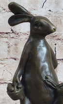 Easter Bunnies Rabbit Holding Basket of Eggs Bronze Sculpture