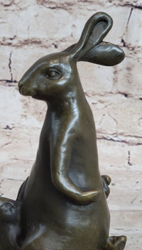 Easter Bunnies Rabbit Holding Basket of Eggs Bronze Sculpture