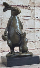 Easter Bunnies Rabbit Holding Basket of Eggs Bronze Sculpture