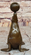 Seal Balancing Ball on Nose - Bronze Sculpture by Milo