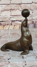 Seal Balancing Ball on Nose - Bronze Sculpture by Milo