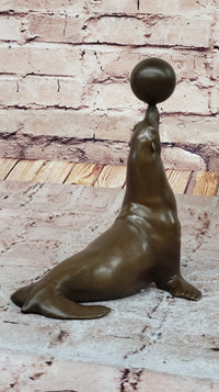 Seal Balancing Ball on Nose - Bronze Sculpture by Milo