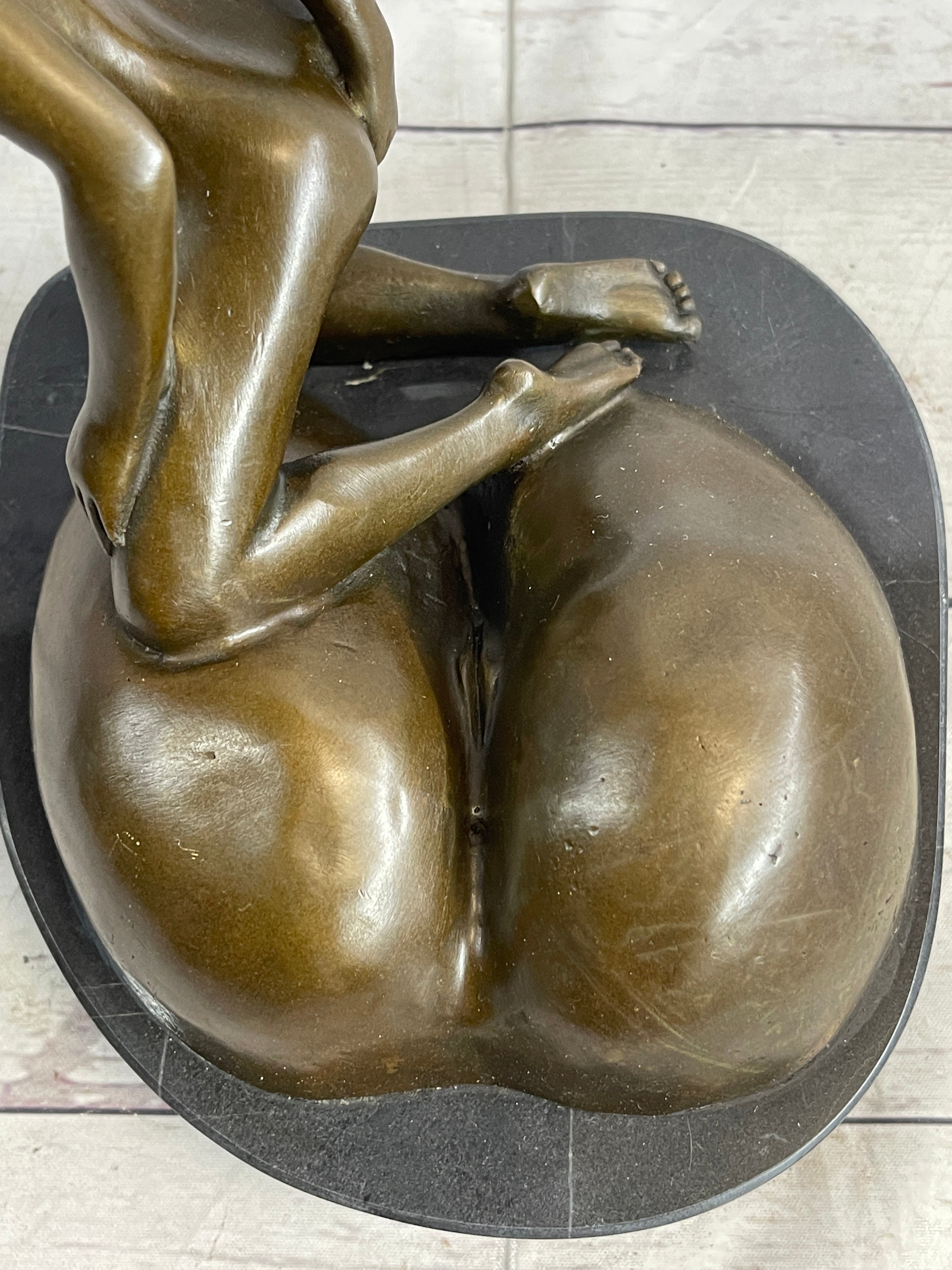 Mavchi Nude Woman Resting on a large Ass Bronze Erotic Sculpture