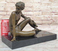 Young Man Reading a Book on the Beach - Bronze by Preiss