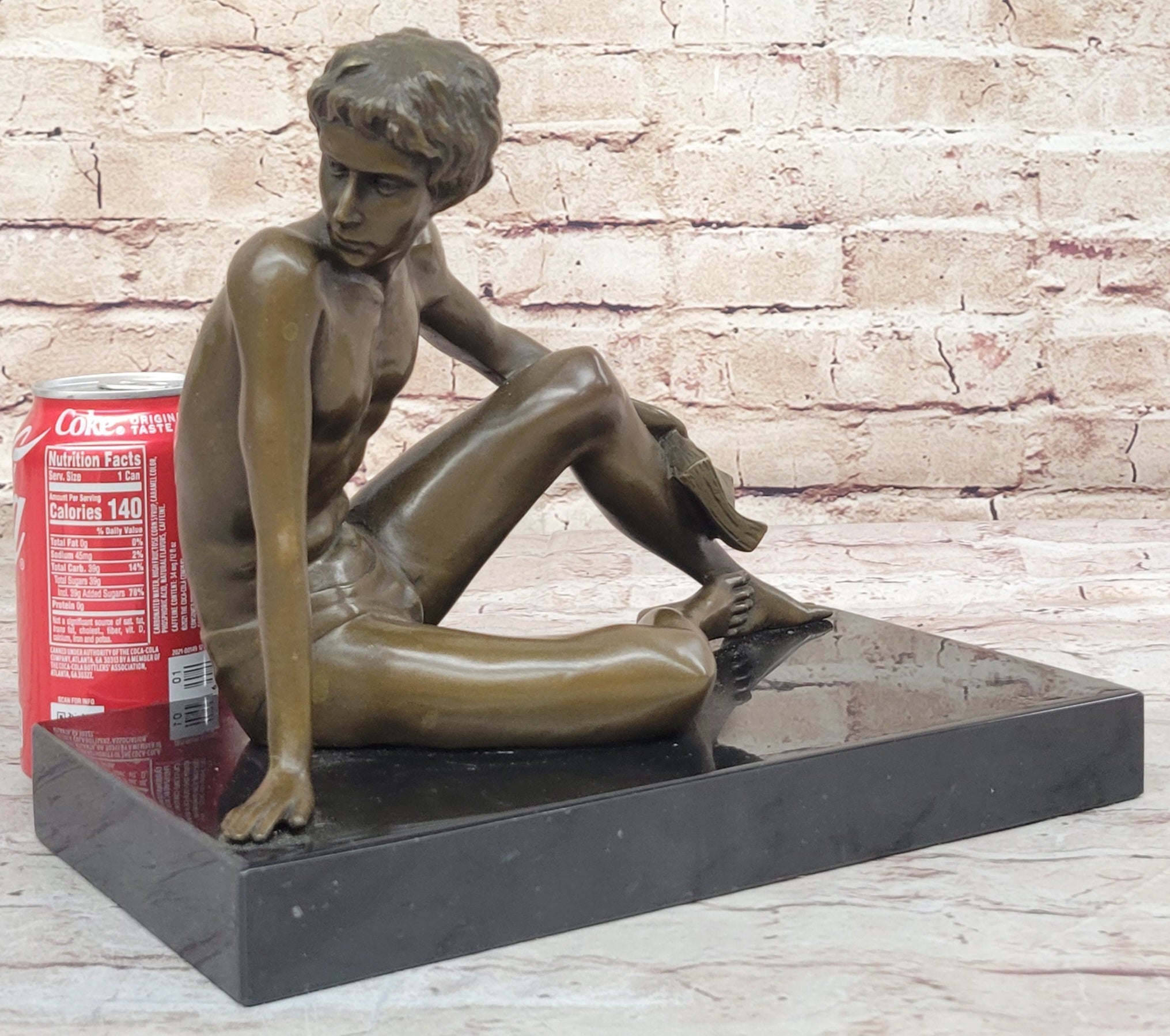 Young Man Reading a Book on the Beach - Bronze by Preiss