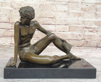 Young Man Reading a Book on the Beach - Bronze by Preiss