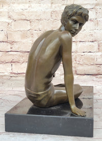 Young Man Reading a Book on the Beach - Bronze by Preiss