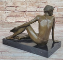 Young Man Reading a Book on the Beach - Bronze by Preiss