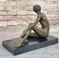 Young Man Reading a Book on the Beach - Bronze by Preiss