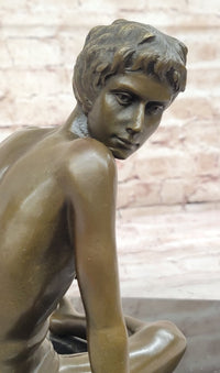 Young Man Reading a Book on the Beach - Bronze by Preiss